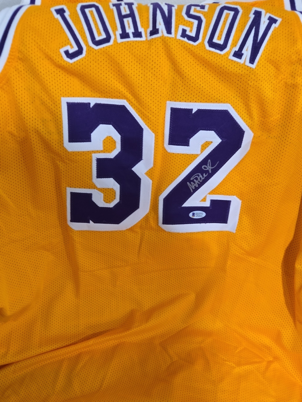 Signed #32 Basketball Jersey in Gold & Purple